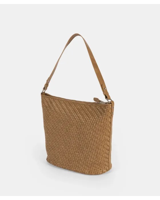 El bolso que puede con todo (y con estilo). 🐚✨ 2